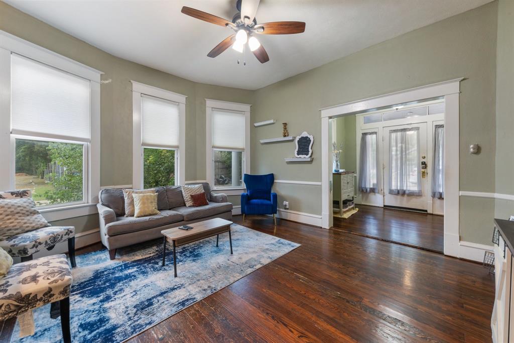 5502 Victor Street Dallas, TX 75214 - Photo 7 of 22 a living room with furniture and a large window