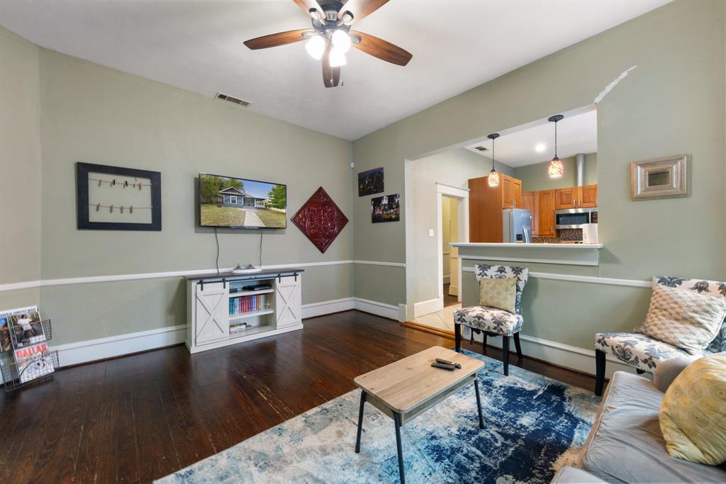 5502 Victor Street Dallas, TX 75214 - Photo 8 of 22 a living room with furniture and wooden floor
