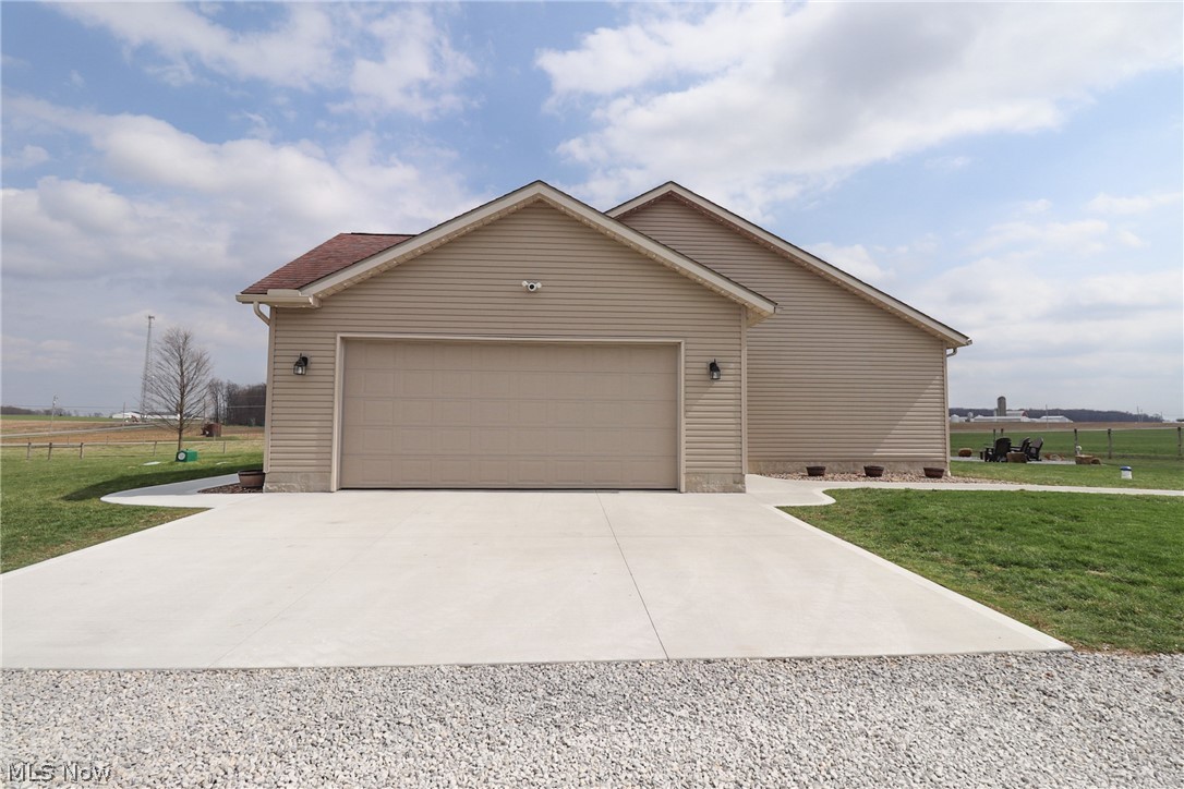 1153 East Pleasant Home Road Wooster, OH 44691 - Photo 10 of 48 Attached garage with concrete slab.
