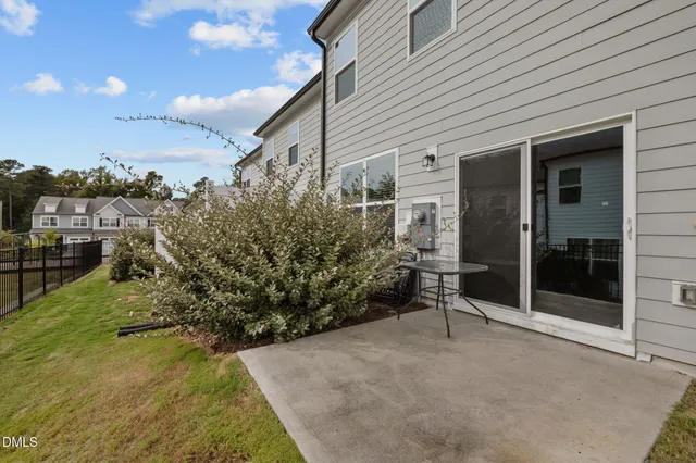 a view of a chairs in front of house