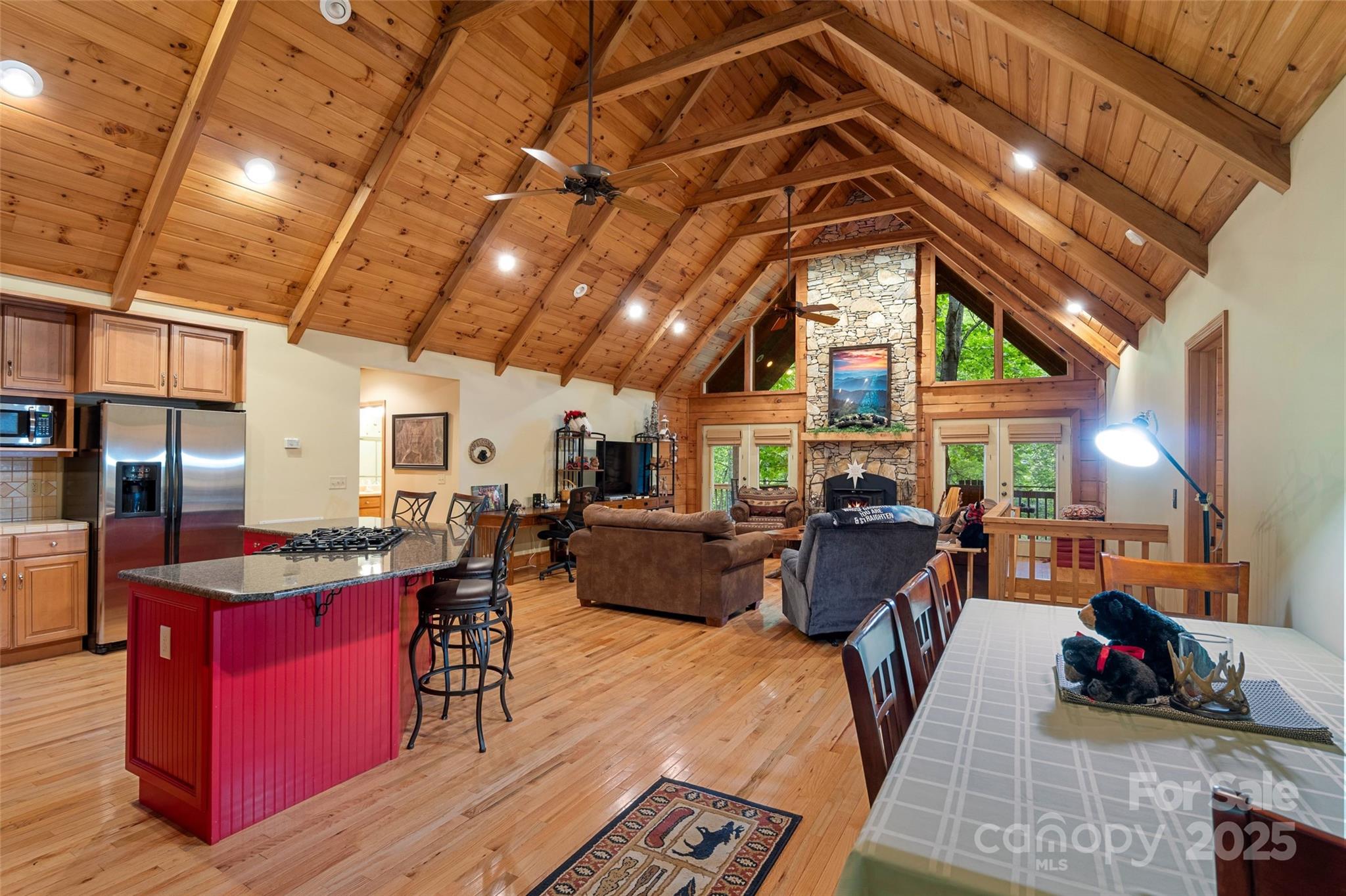 12215 Big Laurel Road Marshall, NC 28753 - Photo 11 of 44 a living room with furniture and a chandelier