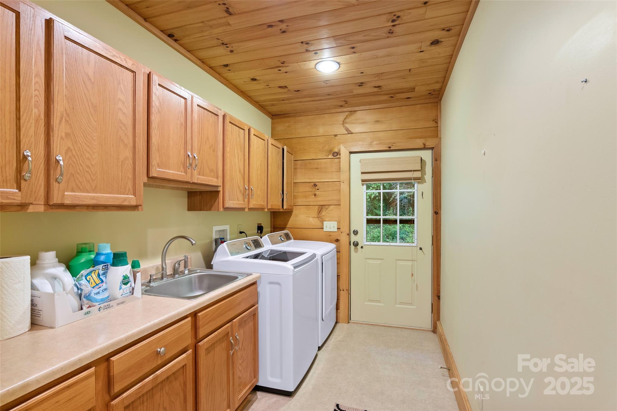 12215 Big Laurel Road Marshall, NC 28753 - Photo 19 of 44 a kitchen with sink a oven and cabinets