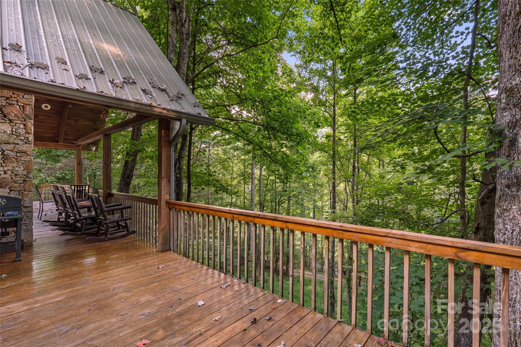 12215 Big Laurel Road Marshall, NC 28753 - Photo 28 of 44 a view of a two chairs and table in the balcony