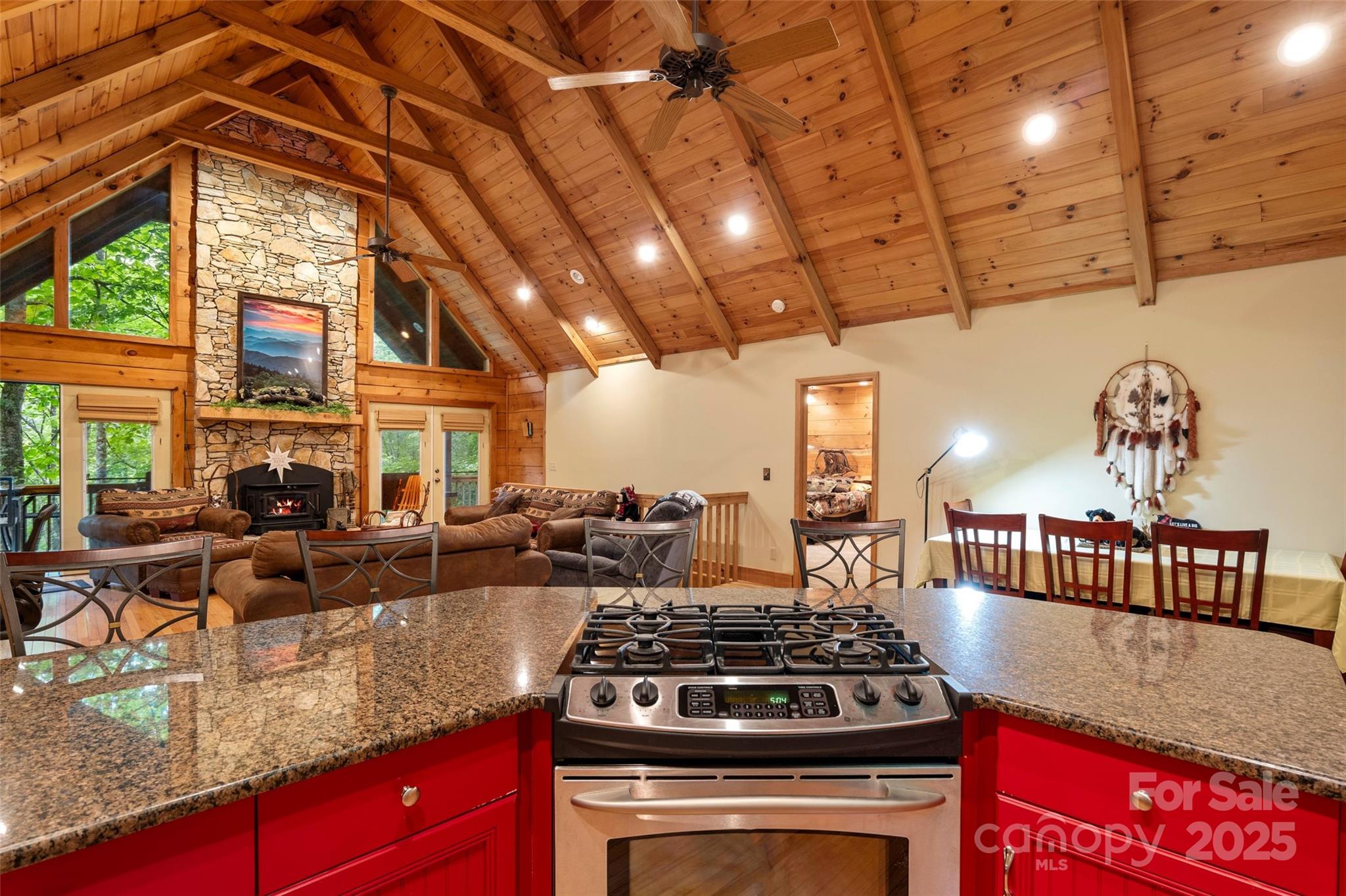 12215 Big Laurel Road Marshall, NC 28753 - Photo 10 of 44 a kitchen with stove and cabinets