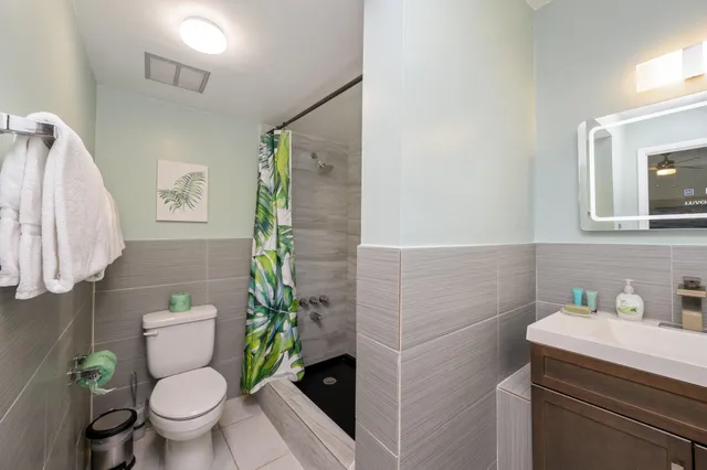 a bathroom with a toilet and a sink