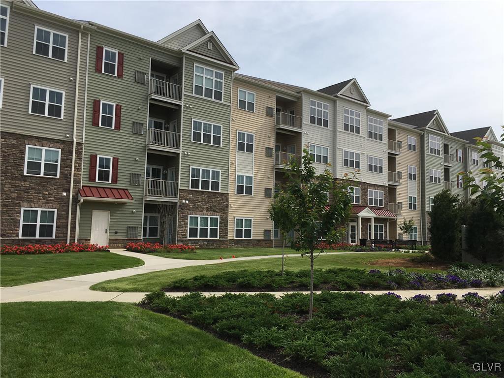 311 Robert Morris Boulevard, Unit 4 Allentown, PA 18104 - Photo 2 of 7 a front view of a building with a garden