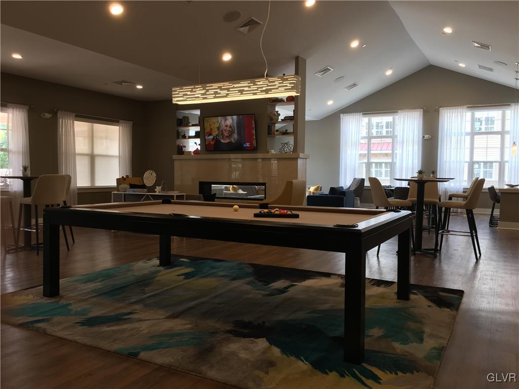 311 Robert Morris Boulevard, Unit 4 Allentown, PA 18104 - Photo 5 of 7 a room with a table chairs and a pool table