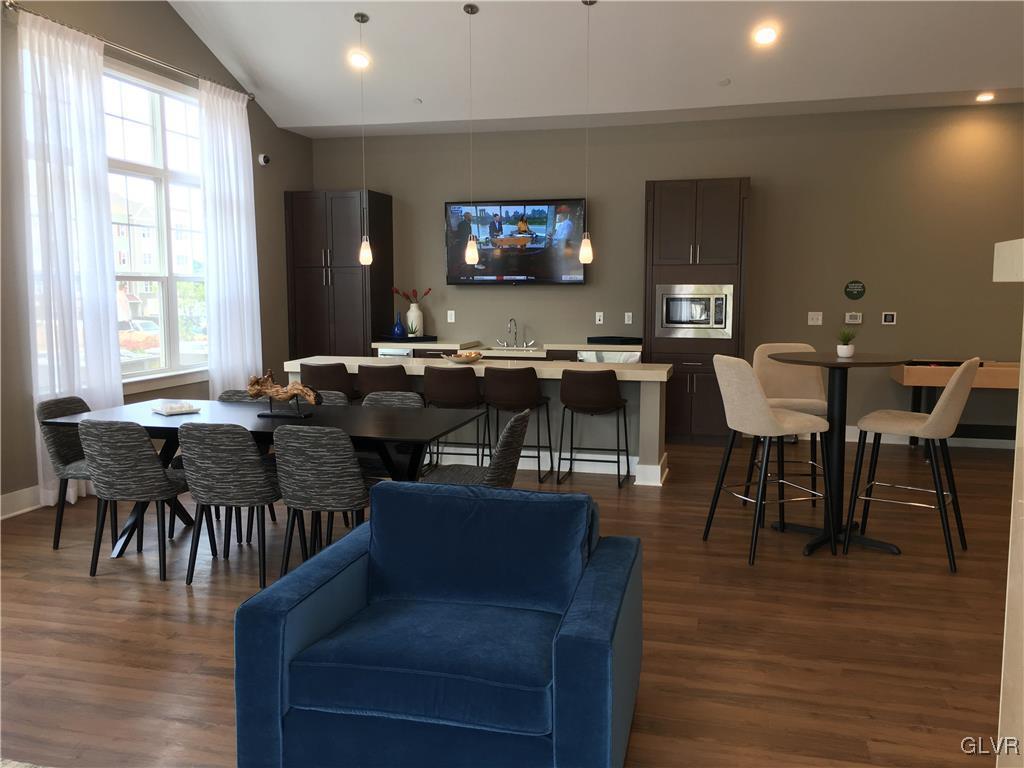 311 Robert Morris Boulevard, Unit 4 Allentown, PA 18104 - Photo 7 of 7 a view of a dining room with furniture window and wooden floor