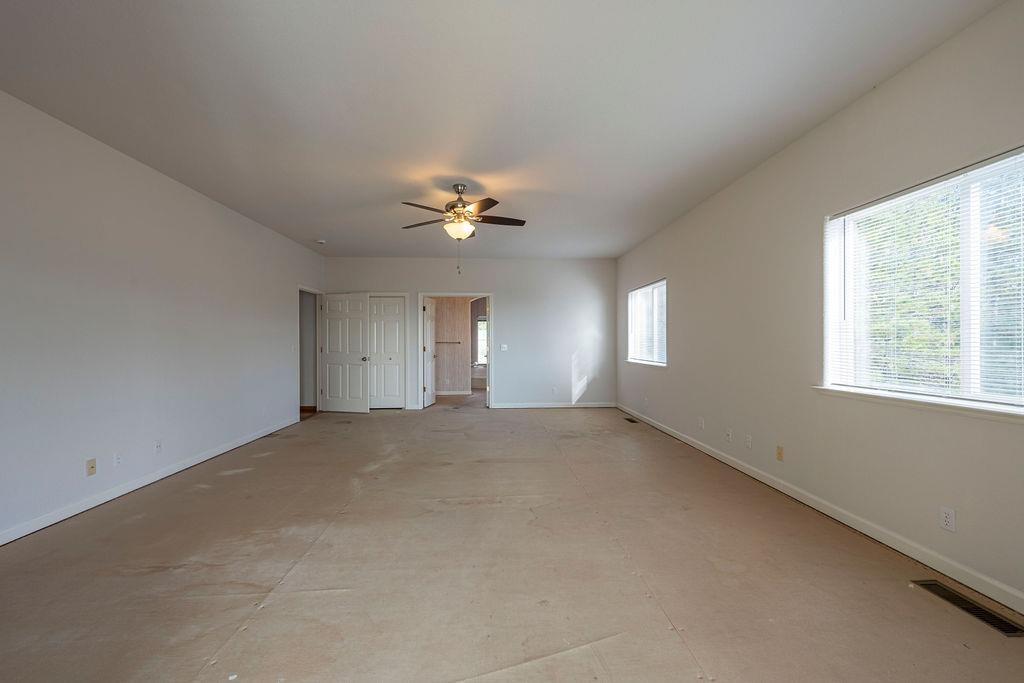 10246 Ranch Road Rough and Ready, CA 95975 - Photo 13 of 69 a view of an empty room with a window