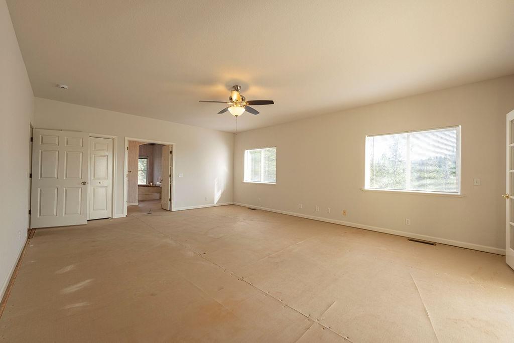 10246 Ranch Road Rough and Ready, CA 95975 - Photo 14 of 69 a view of an empty room with a window