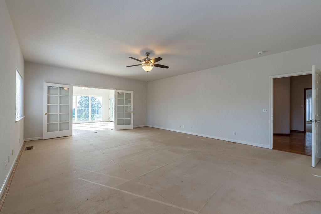 10246 Ranch Road Rough and Ready, CA 95975 - Photo 15 of 69 a view of an empty room with a window