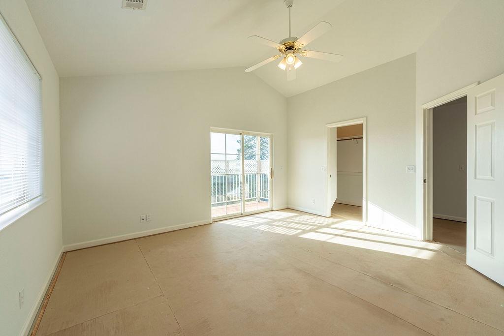 10246 Ranch Road Rough and Ready, CA 95975 - Photo 34 of 69 an empty room with windows and fan