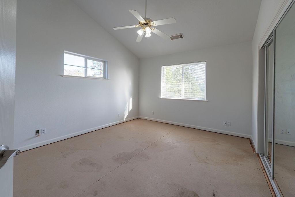 10246 Ranch Road Rough and Ready, CA 95975 - Photo 42 of 69 a view of an empty room with a window