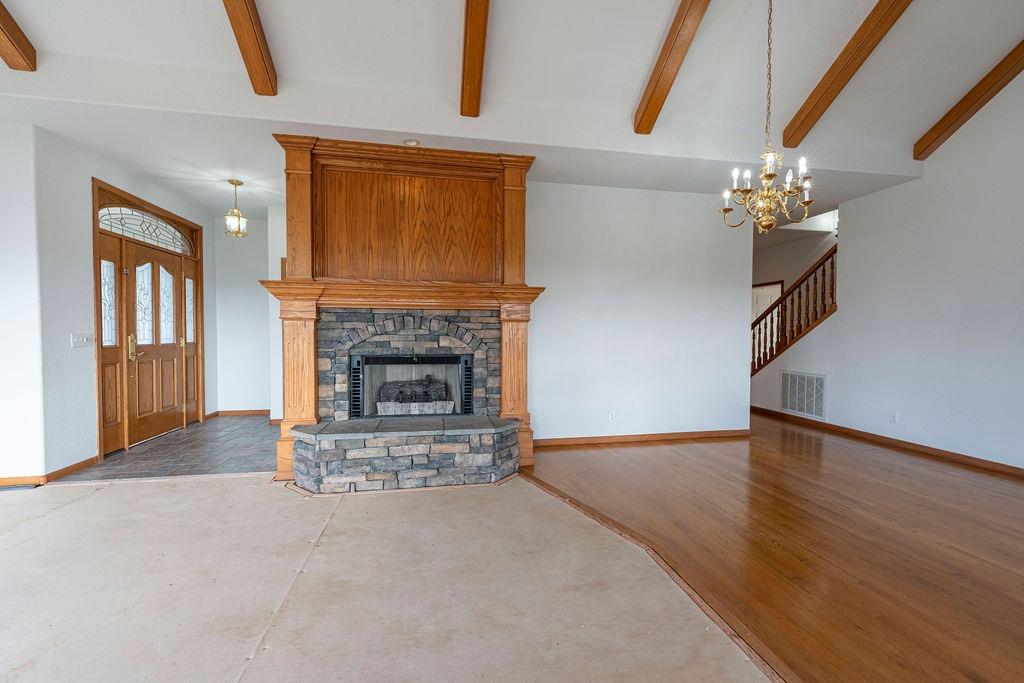 10246 Ranch Road Rough and Ready, CA 95975 - Photo 5 of 69 a living room with furniture and a fireplace
