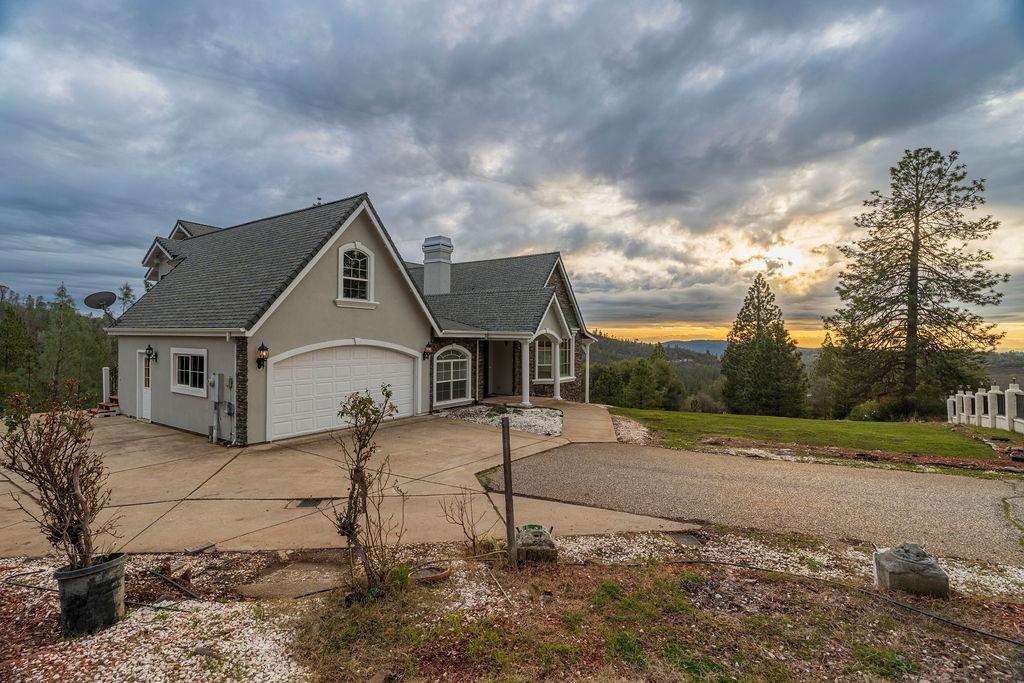 10246 Ranch Road Rough and Ready, CA 95975 - Photo 60 of 69 a front view of a house with a yard