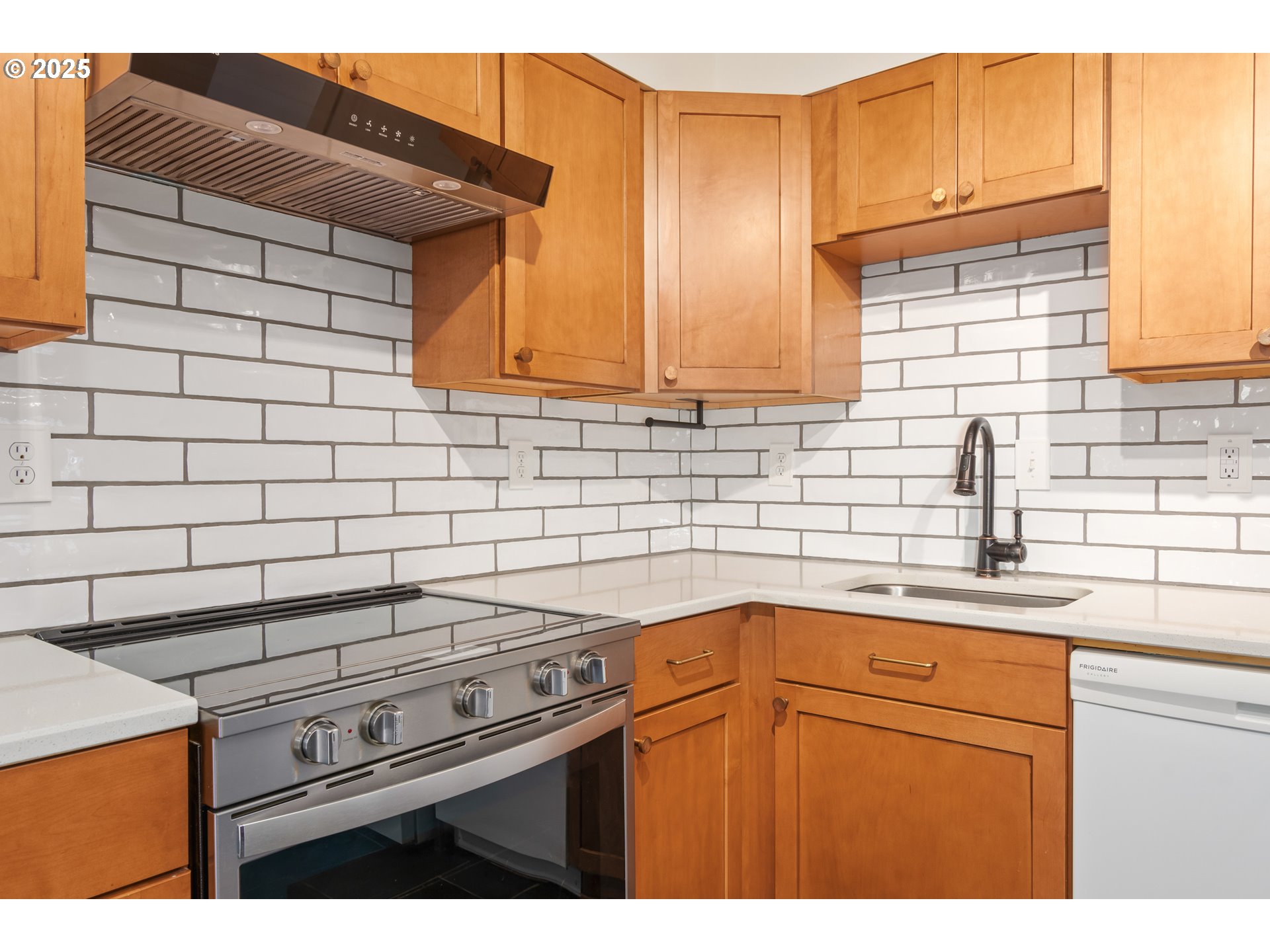 2765 Kismet Way Eugene, OR 97405 - Photo 17 of 46 a kitchen with a sink cabinets and appliances