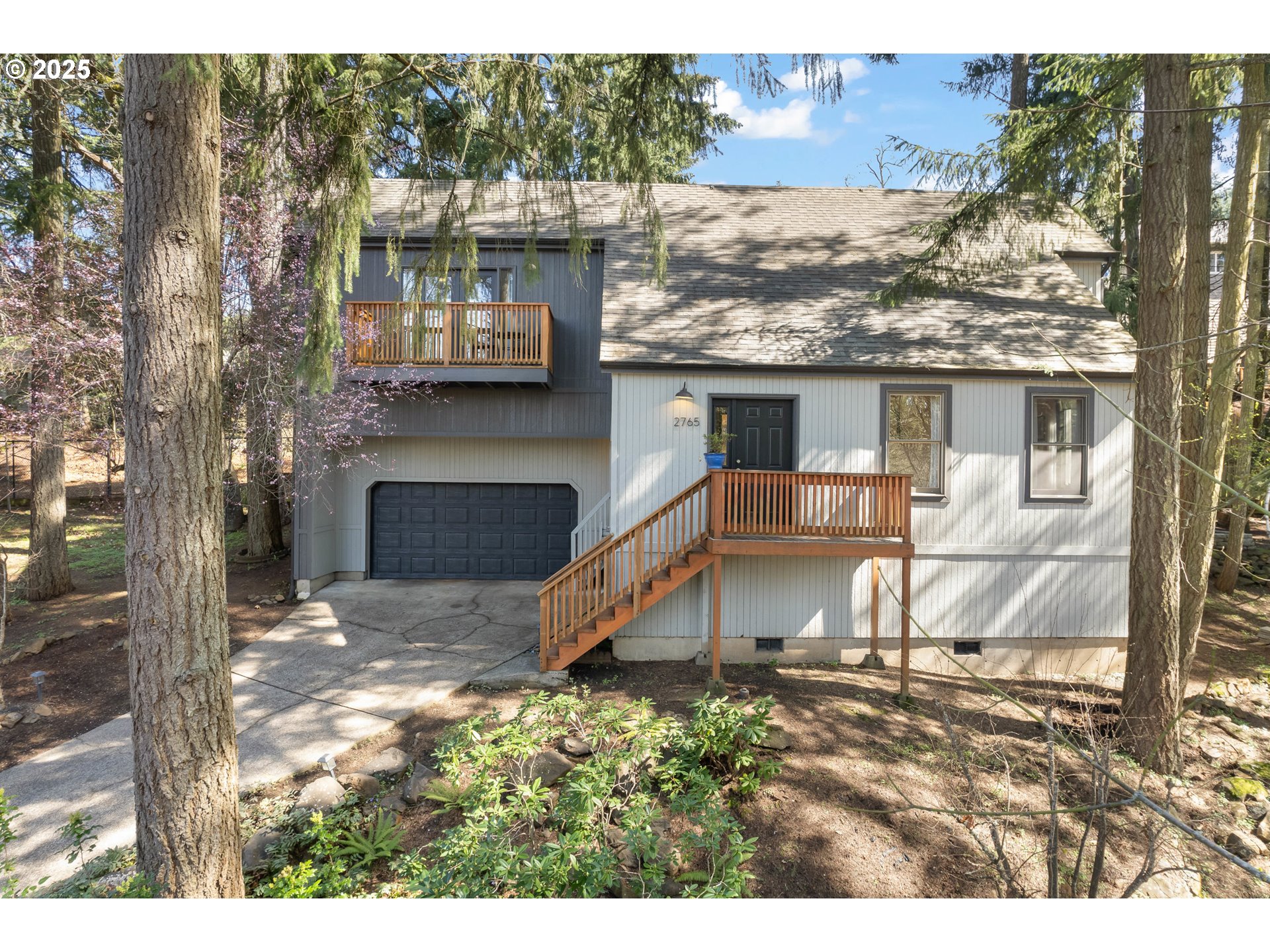 2765 Kismet Way Eugene, OR 97405 - Photo 2 of 46 a view of a house with a yard and sitting area