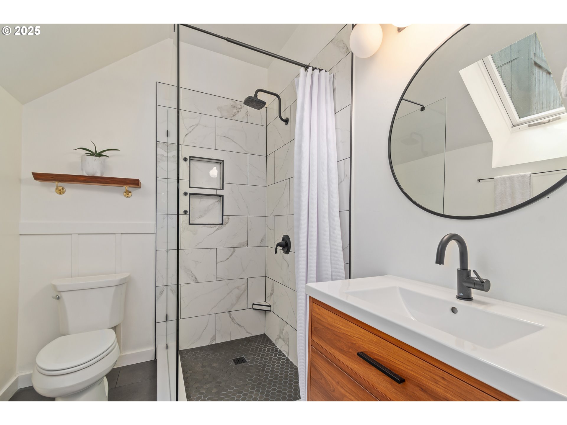 2765 Kismet Way Eugene, OR 97405 - Photo 29 of 46 a bathroom with a toilet sink and mirror