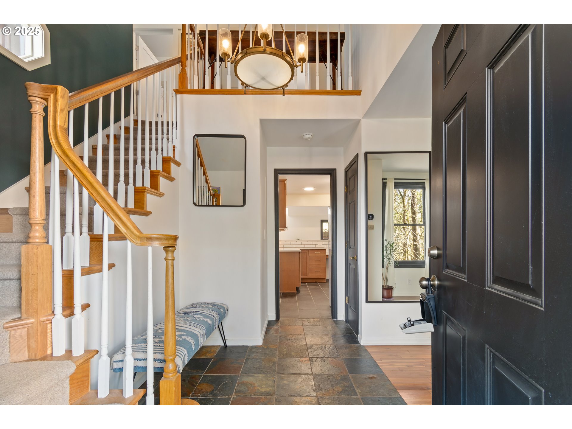 2765 Kismet Way Eugene, OR 97405 - Photo 3 of 46 a view of an entryway with wooden floor