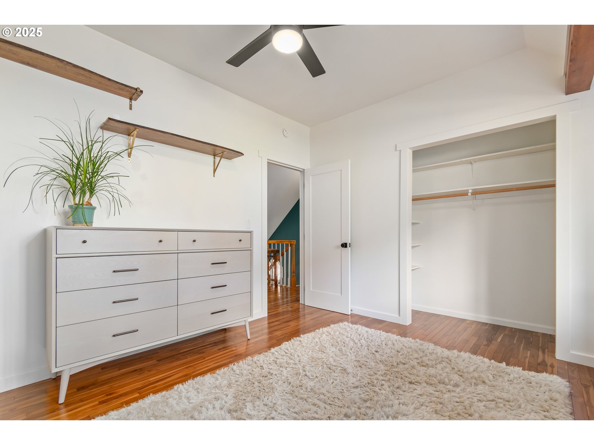 2765 Kismet Way Eugene, OR 97405 - Photo 32 of 46 a bedroom with a bed and a dresser