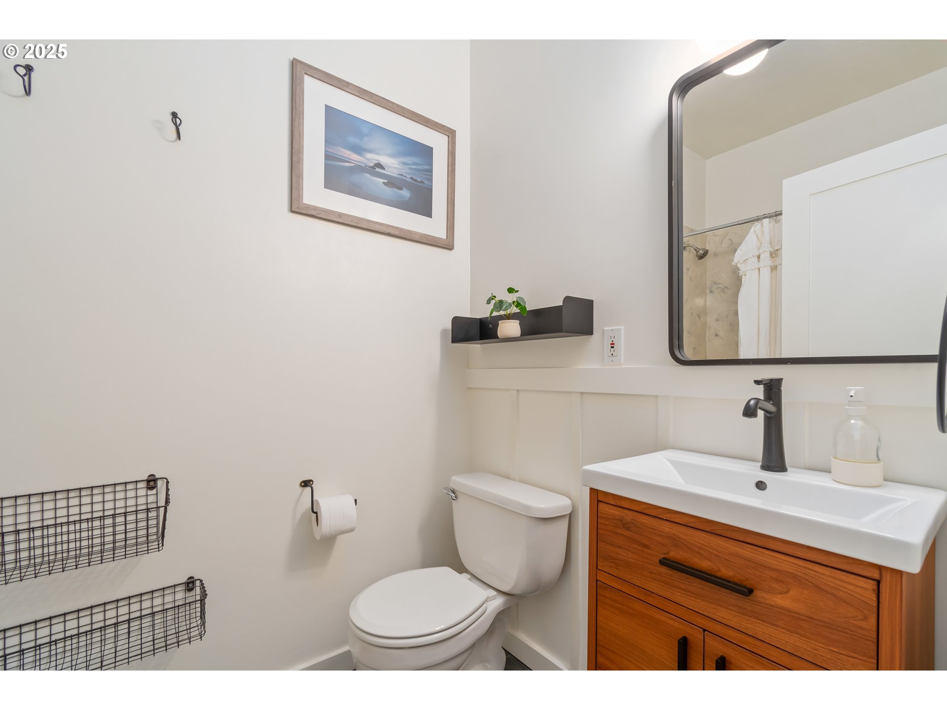 2765 Kismet Way Eugene, OR 97405 - Photo 35 of 46 a bathroom with a toilet sink and mirror