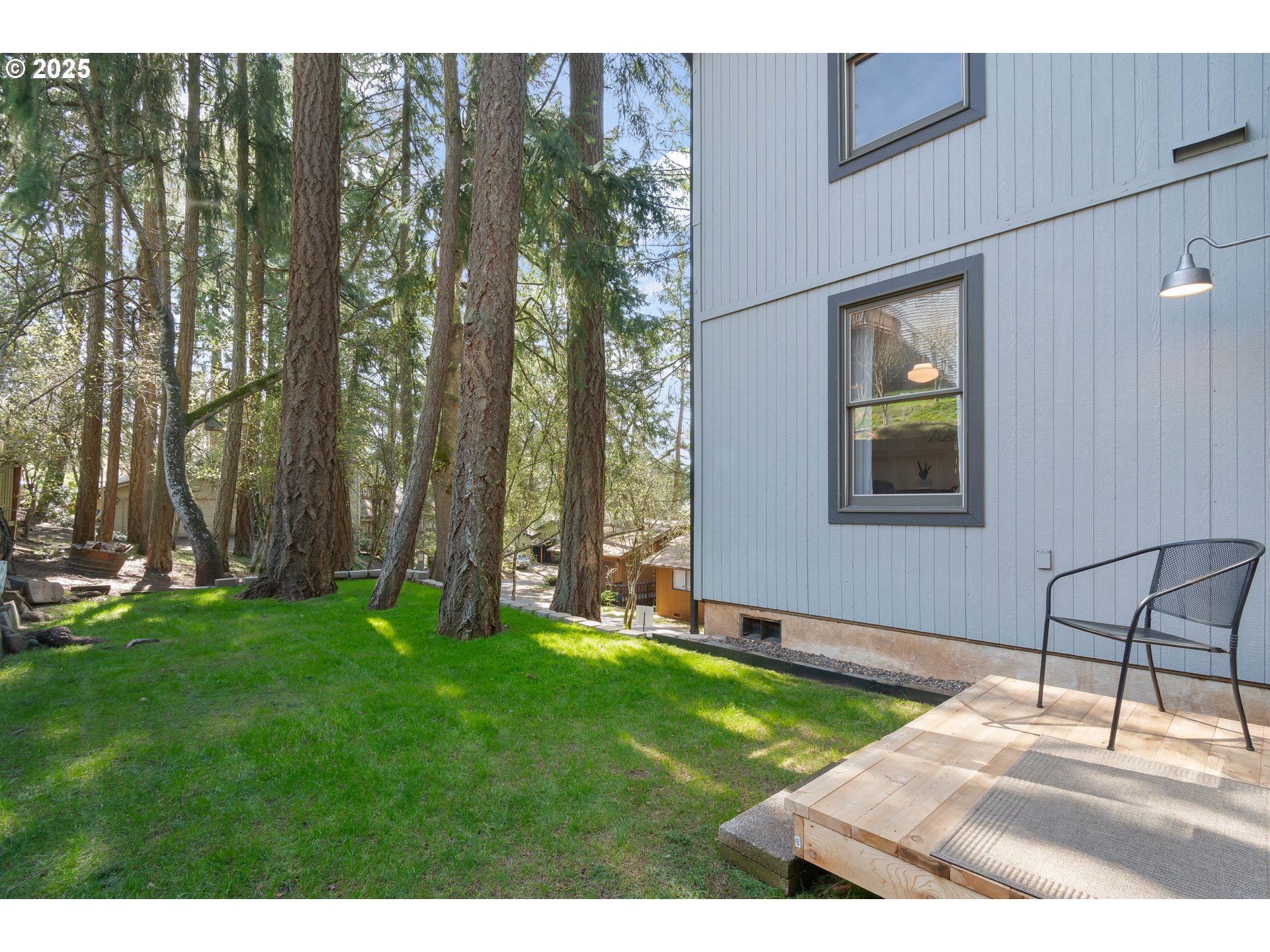 2765 Kismet Way Eugene, OR 97405 - Photo 39 of 46 a view of a backyard with table and chairs with wooden fence