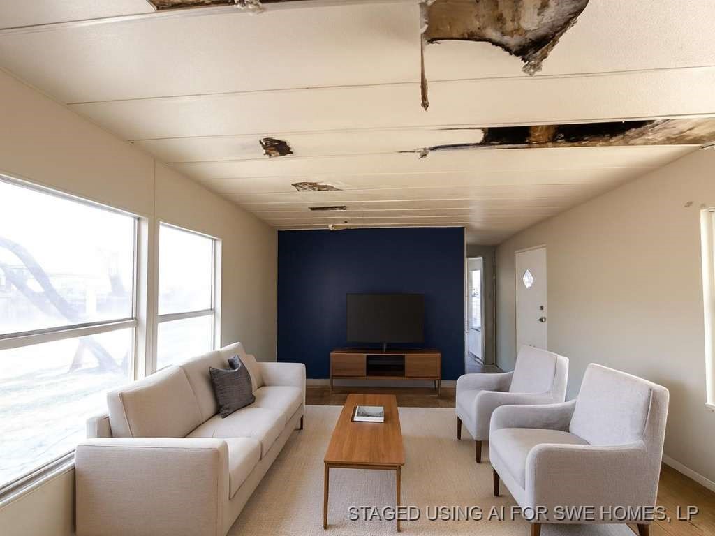 506 Beech Street Jourdanton, TX 78026 - Photo 5 of 11 a living room with furniture and a window
