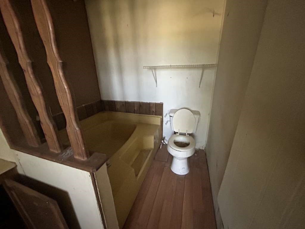 506 Beech Street Jourdanton, TX 78026 - Photo 10 of 11 a bathroom with a toilet and a sink
