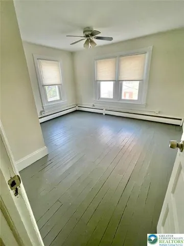 an empty room with a door