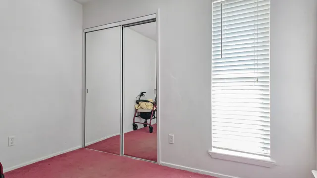 a view of a room that has a window