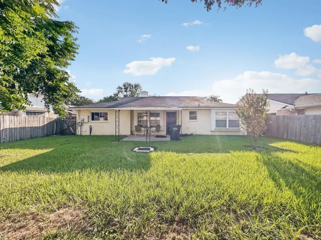 front view of a house and a yard