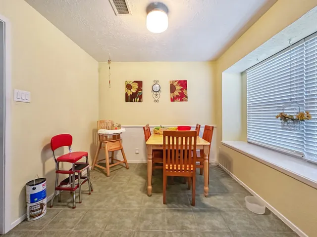 a view of a room with furniture and toys