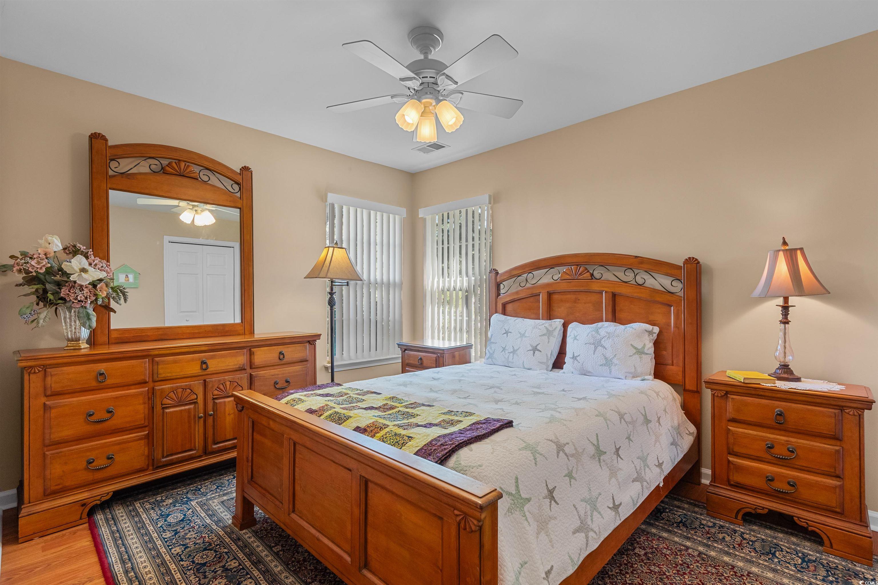 3505 Arrowhead Boulevard Myrtle Beach, SC 29579 - Photo 23 of 40 Bedroom featuring light wood-style flooring and a ceiling fan