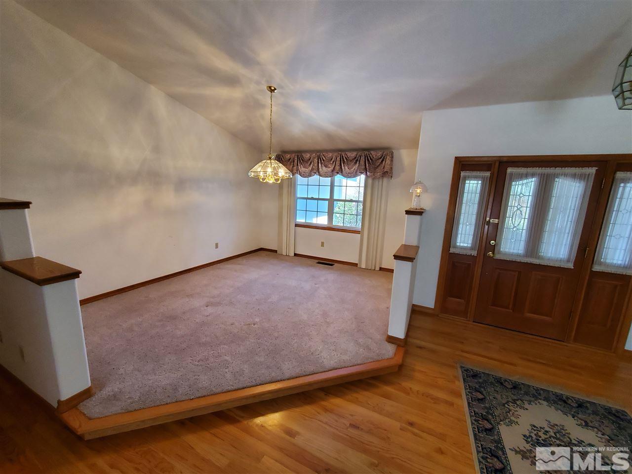 12650 Buckthorn Lane Reno, NV 89511 - Photo 5 of 20 wooden floor in an empty room with a window