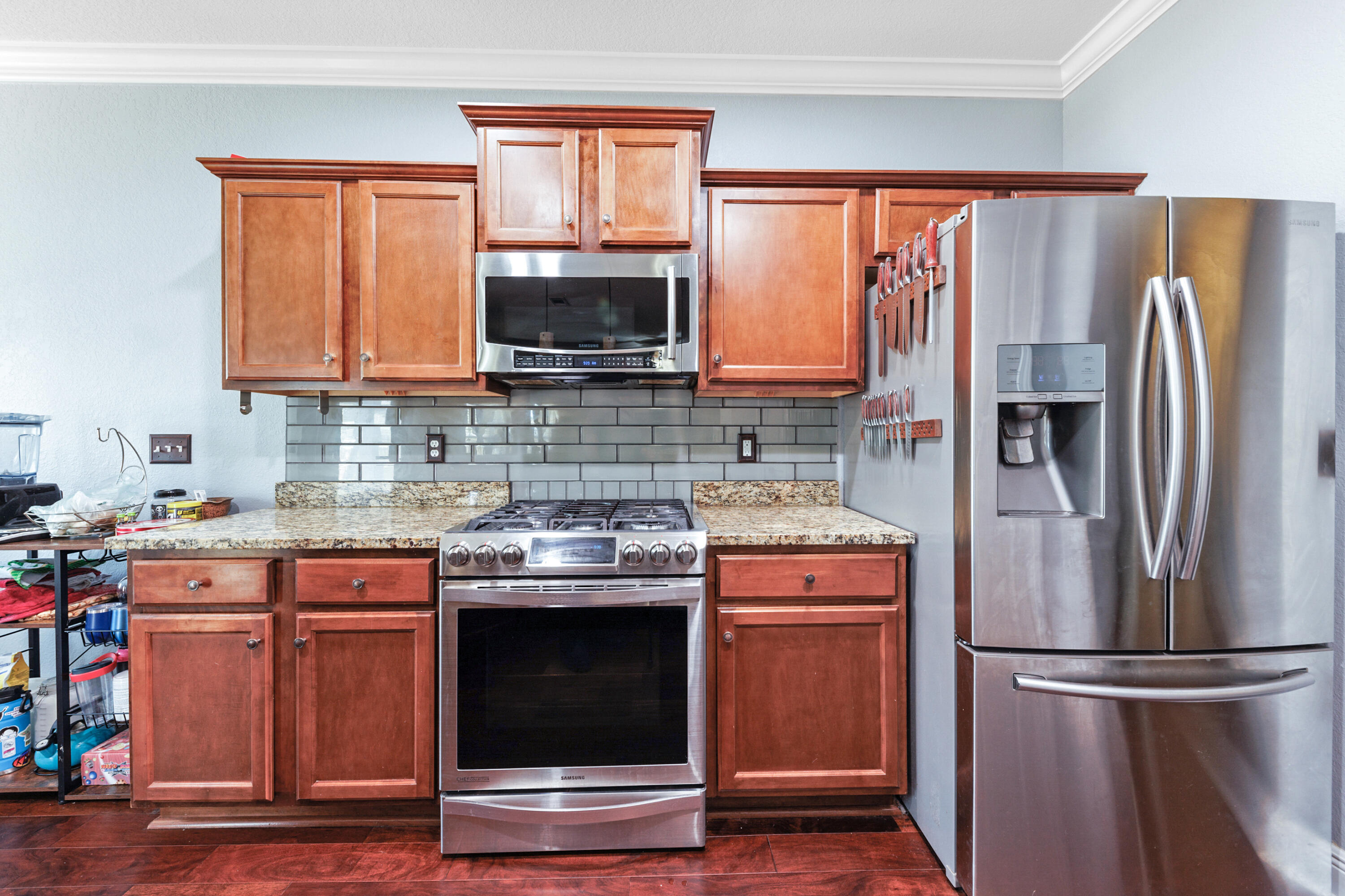 4417 Mirada Way Crestview, FL 32539 - Photo 11 of 37 a kitchen with a refrigerator stove and sink
