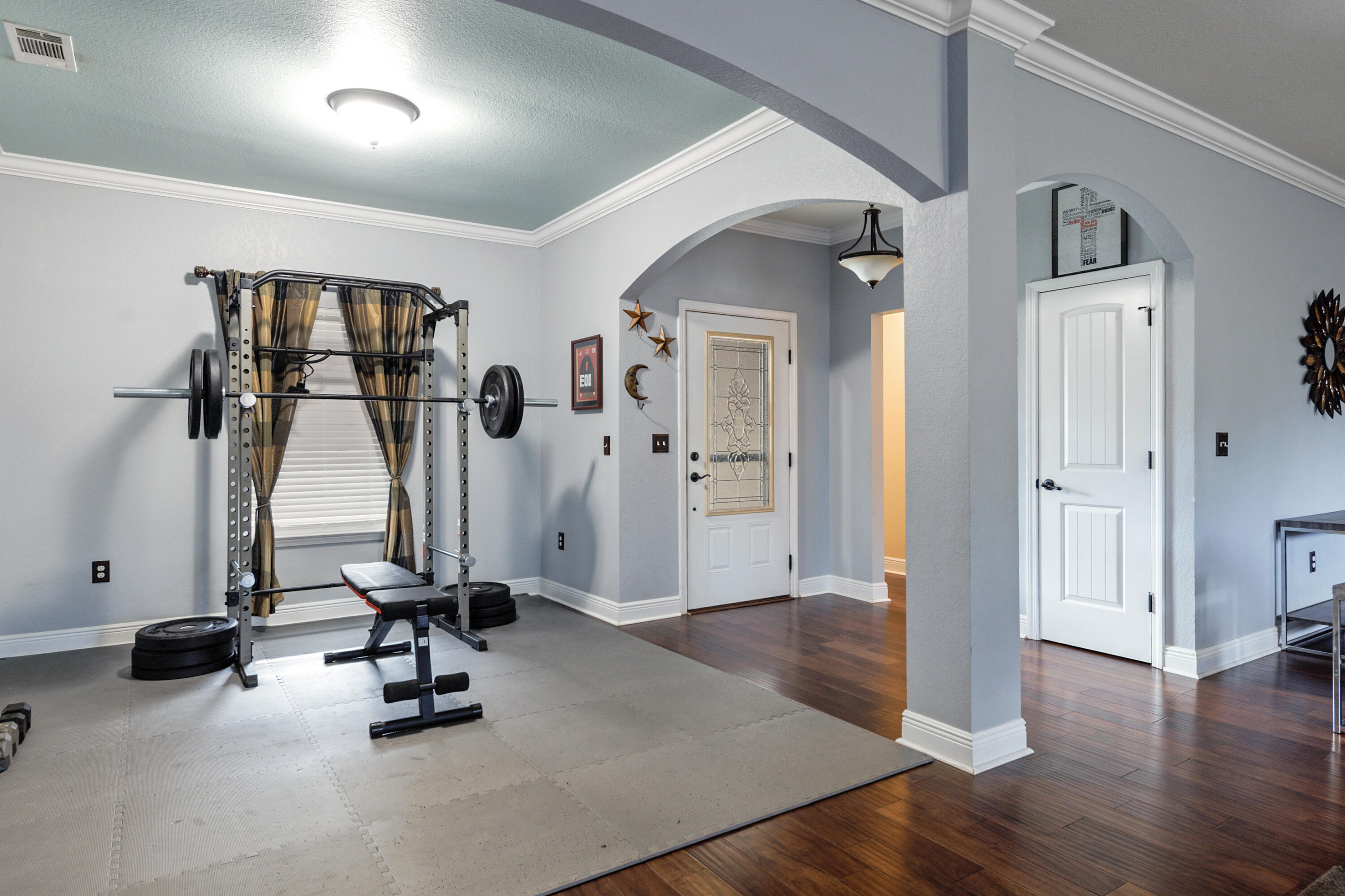 4417 Mirada Way Crestview, FL 32539 - Photo 16 of 37 a view of a room with gym equipment