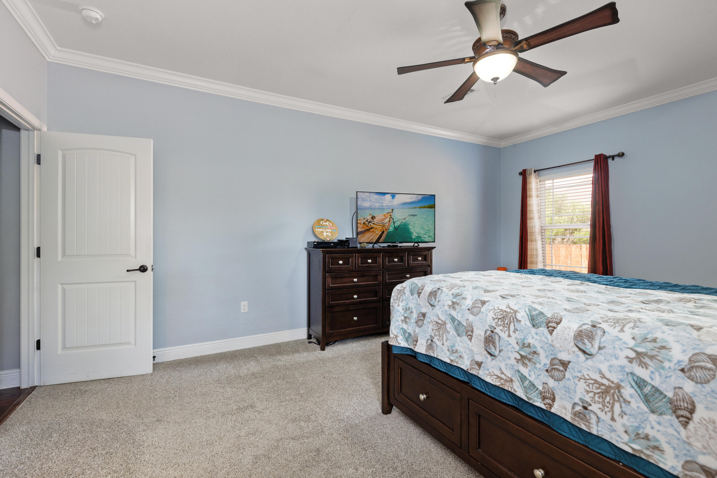 4417 Mirada Way Crestview, FL 32539 - Photo 20 of 37 a bedroom with a bed and a dresser
