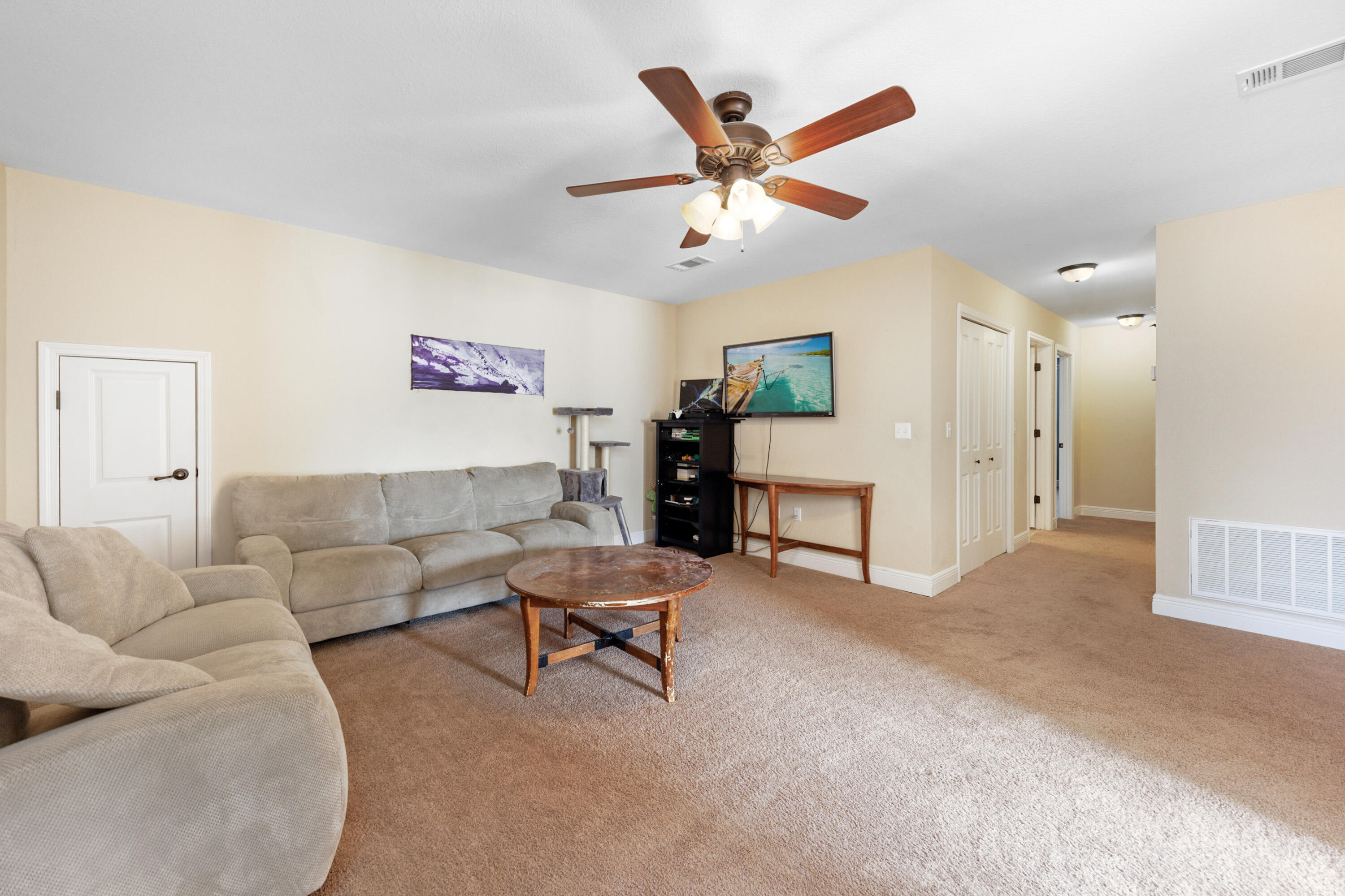 4417 Mirada Way Crestview, FL 32539 - Photo 25 of 37 a living room with furniture and a large window