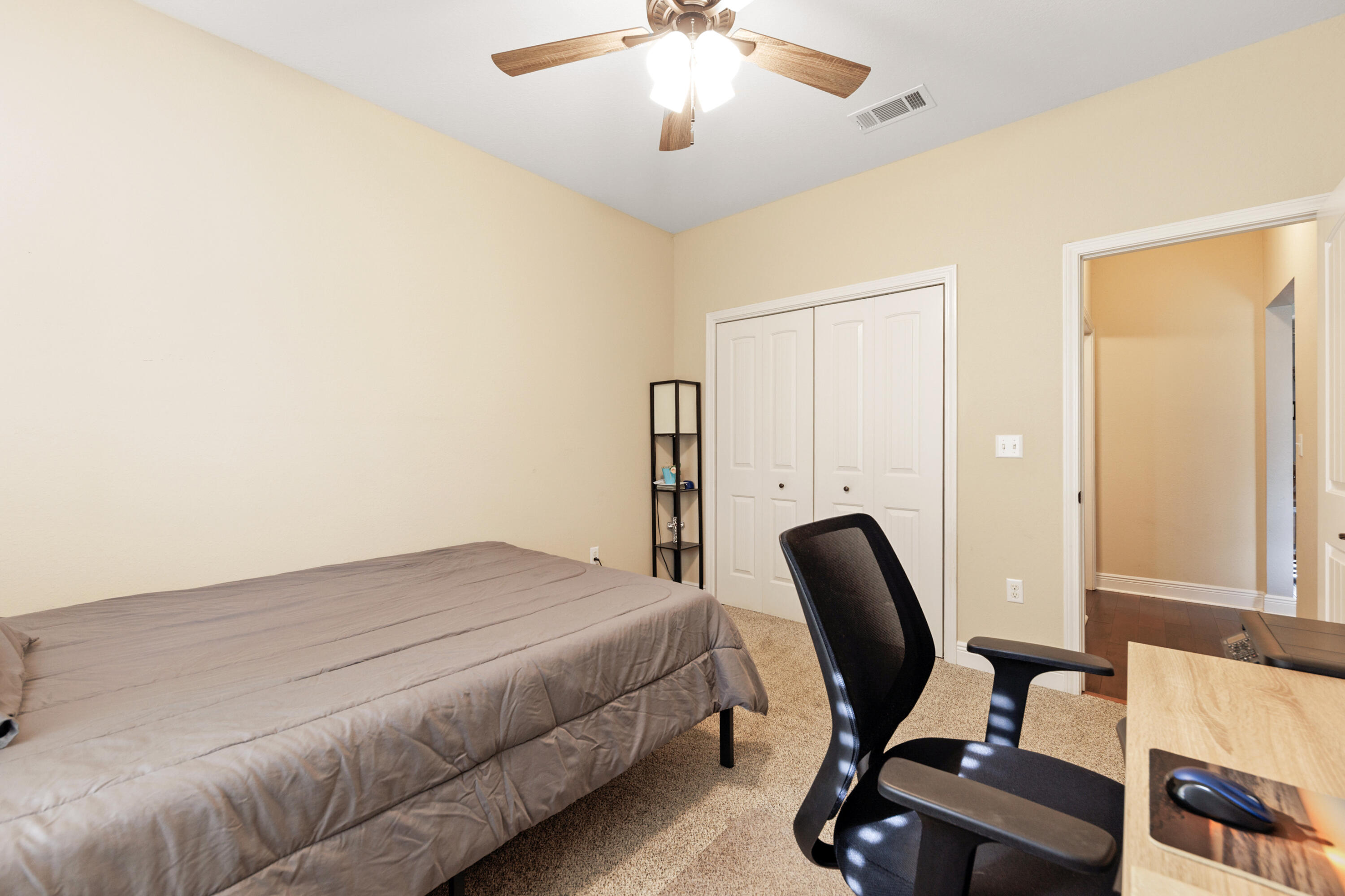 4417 Mirada Way Crestview, FL 32539 - Photo 31 of 37 a bedroom with a chair and a window