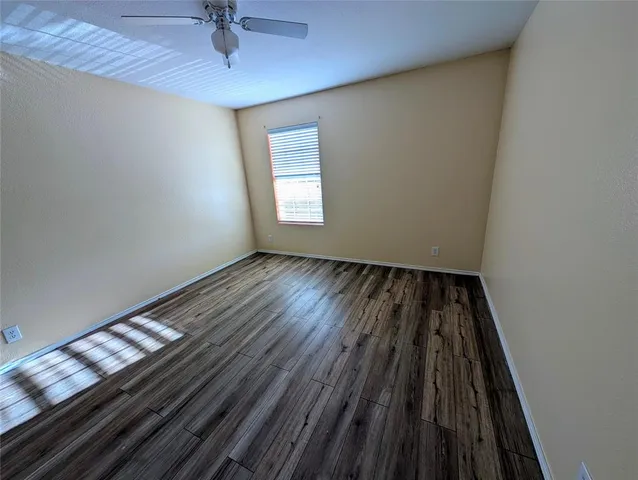 a view of a livingroom with wooden floor
