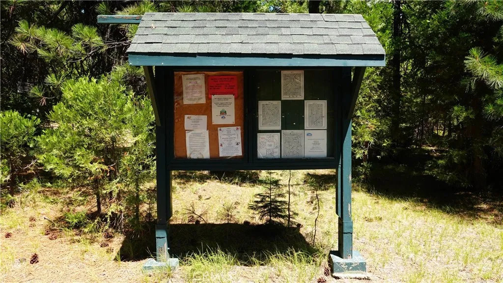 0 Echo McCloud, CA 96057 - Photo 20 of 26 a view of a wooden house with a yard