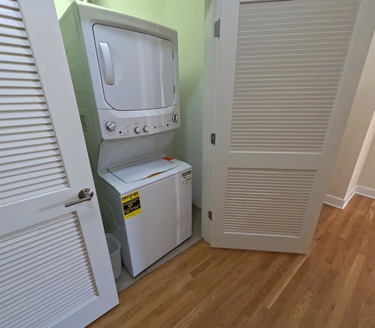 2778 North Milwaukee Avenue, Unit 308 Chicago, IL 60647 - Photo 10 of 18 a utility room with dryer and washer