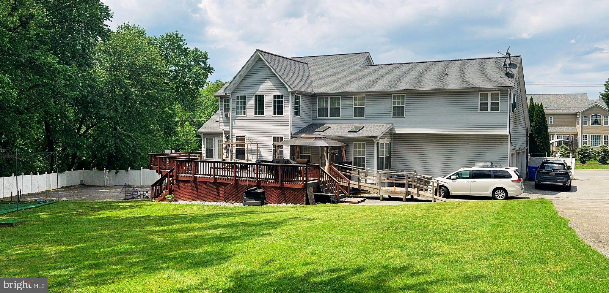 2265 Skyview Place Waldorf, MD 20601 - Photo 2 of 6 a view of a house with a yard and sitting area
