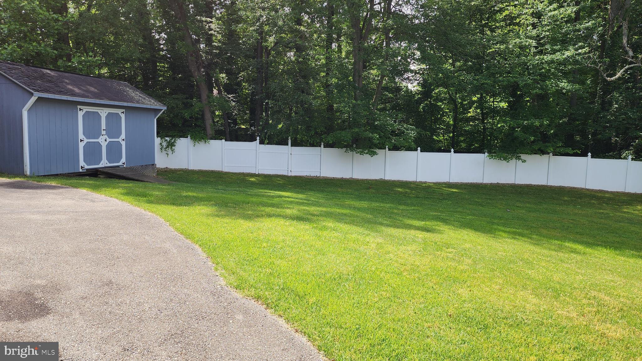 2265 Skyview Place Waldorf, MD 20601 - Photo 3 of 6 a view of a backyard with a small cabin