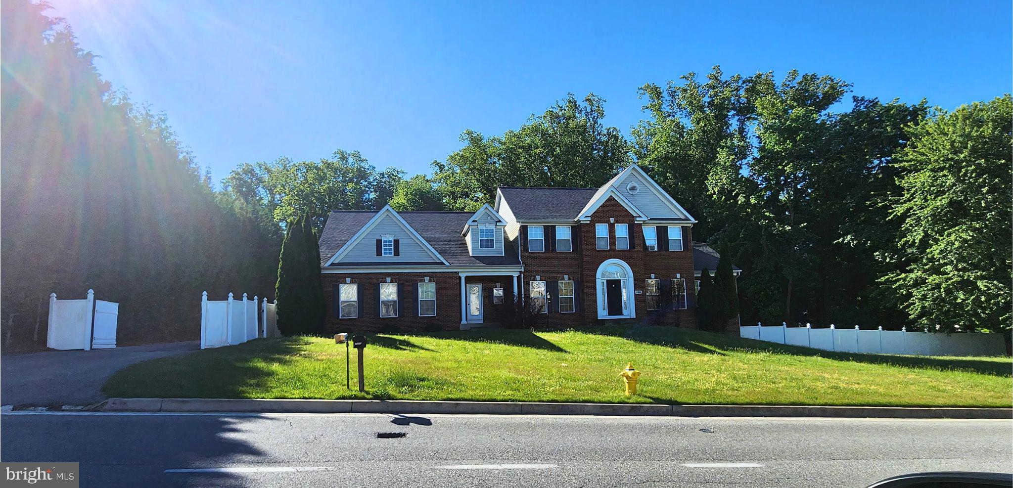 2265 Skyview Place Waldorf, MD 20601 - Photo 6 of 6 a front view of a house with a yard