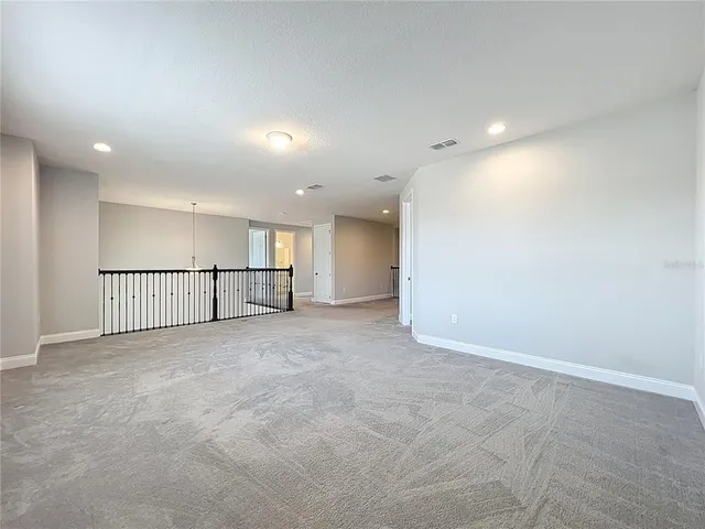 a bathroom with a double vanity sink toilet mirror and bathtub