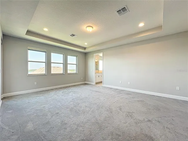 a view of a two chairs in the balcony