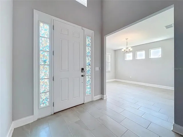 a view of an empty room and window