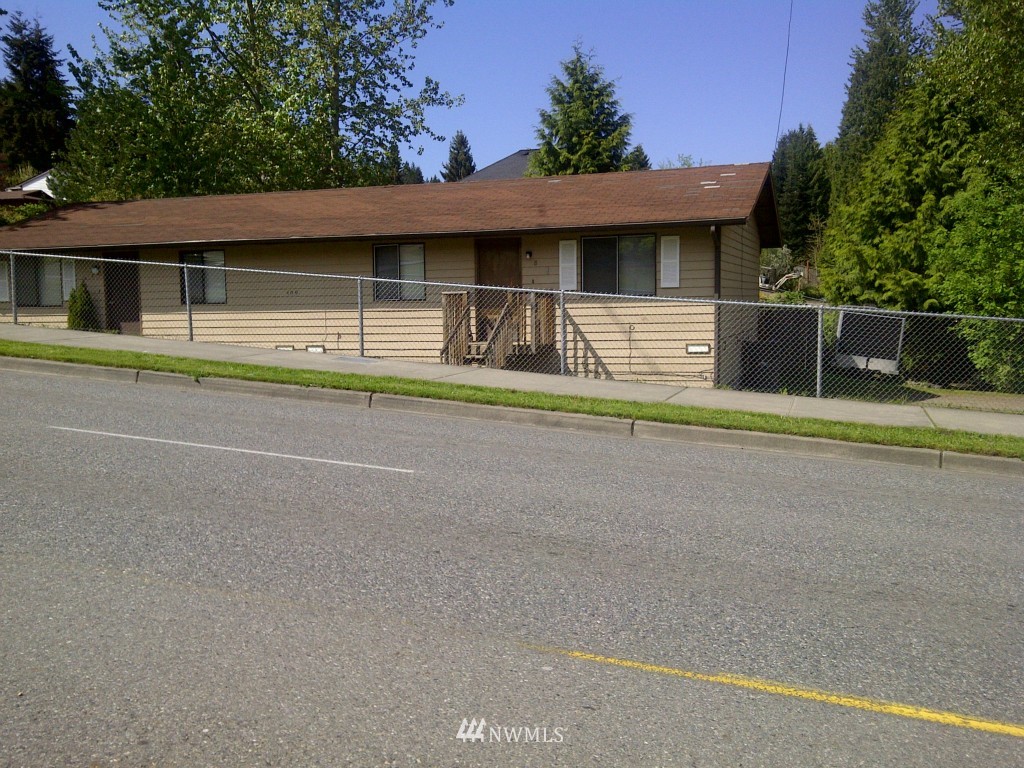 409 228th Street Southeast Bothell, WA 98021 - Photo 1 of 1 a front view of a house with a yard
