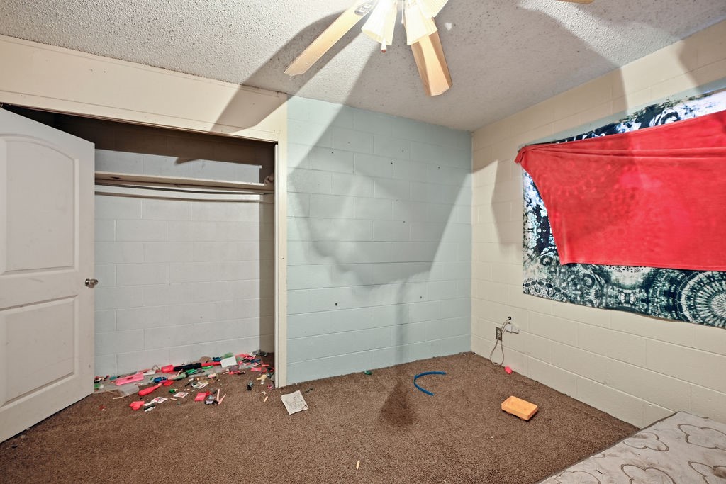 508 South Kenneth Avenue Monahans, TX 79756 - Photo 14 of 39 an empty room with windows